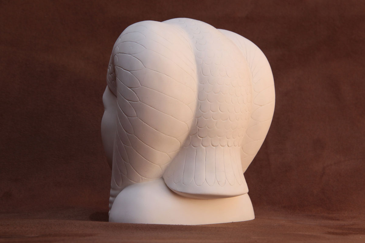 Available for purchase, Egyptian Queens Head in English Plaster, by the Modern Souvenir Company.