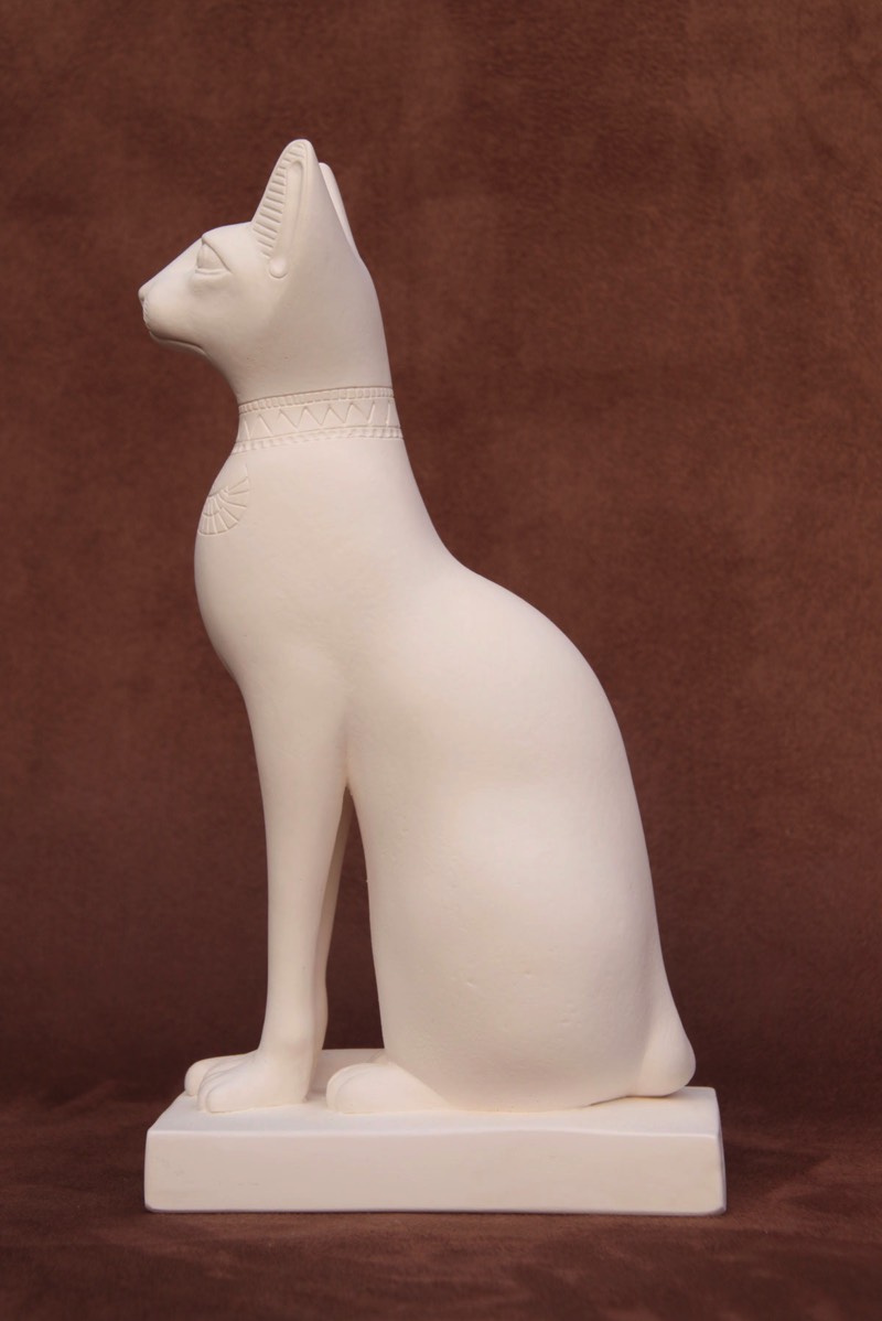 Available for purchase, Cat Goddess Bass in White plaster, handmade by the Modern Souvenir Company.